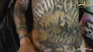 The master makes a tattoo on the brunette&#39;s pussy while she sucks dick