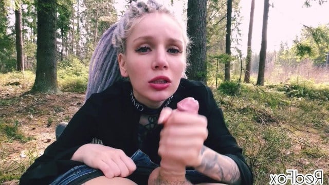 Bad girl flashes her tits in the woods and sucks her friend's cock